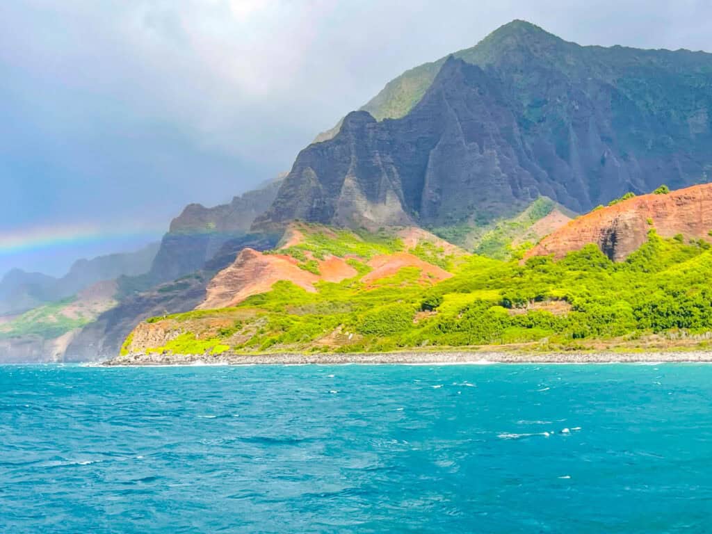 A rainbow at the Na Pali cliffs in Kauai, Hawaii